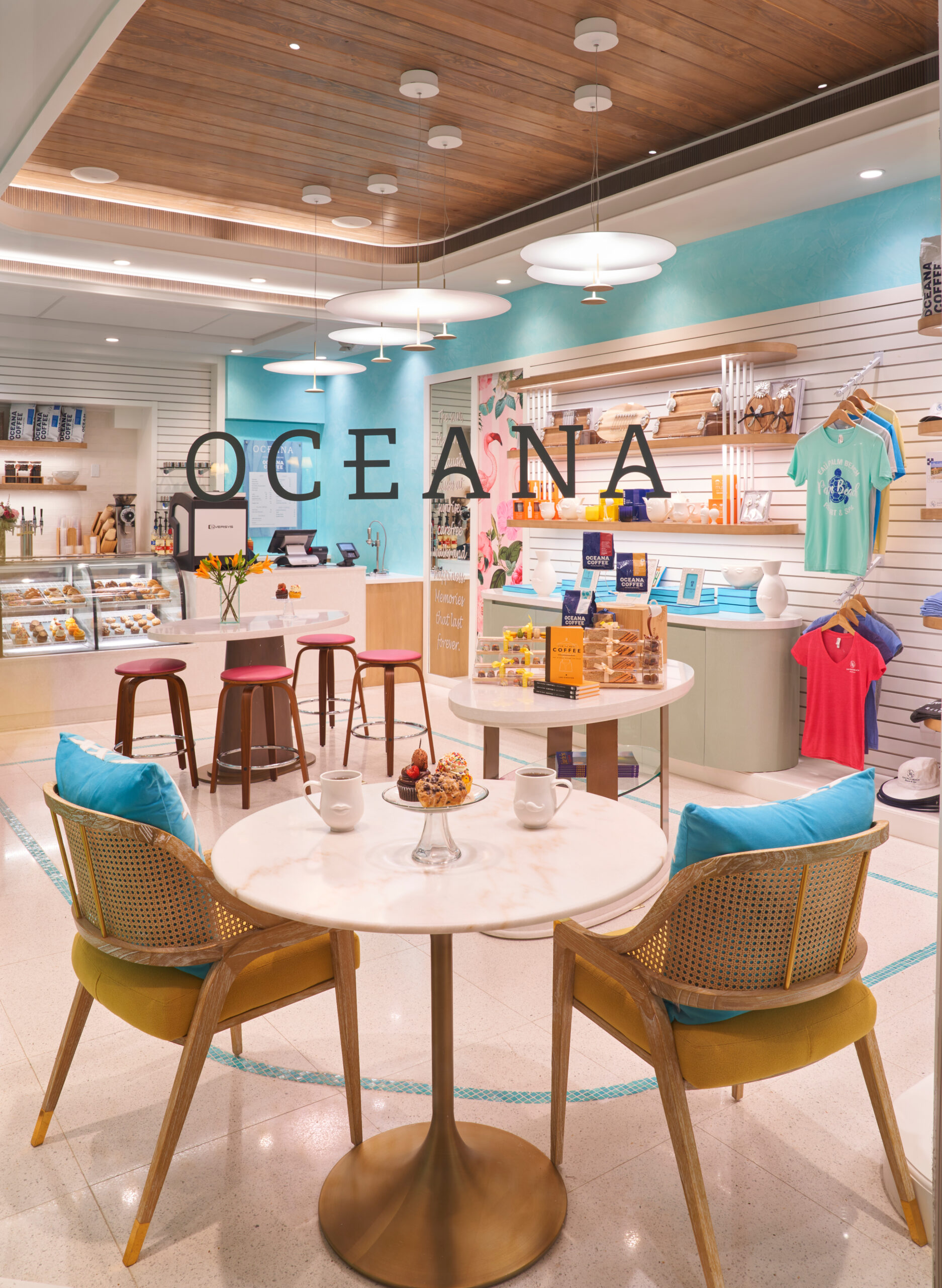 Oceana 3 Bright café and gift shop interior with pastries, coffee, and colorful merchandise displays